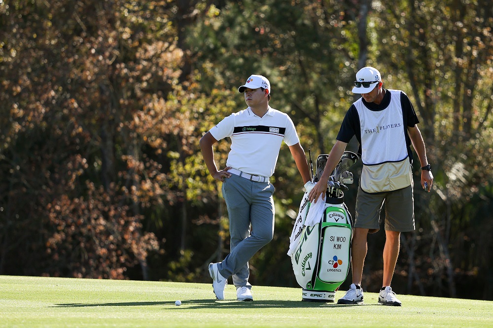 Kim ties career low score