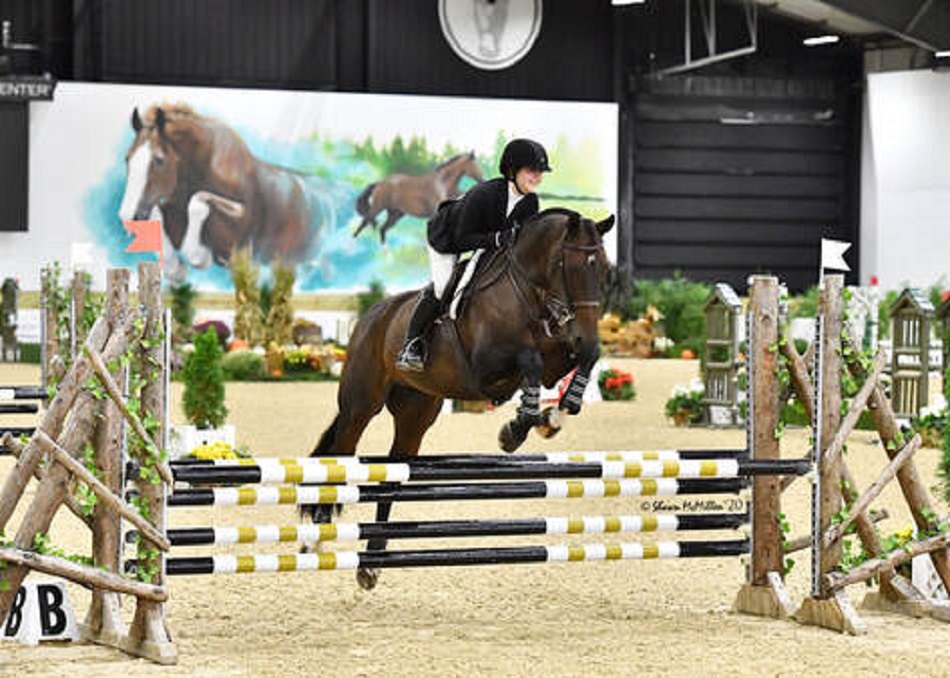 Reese Merna leads at the World Equestrian Centre